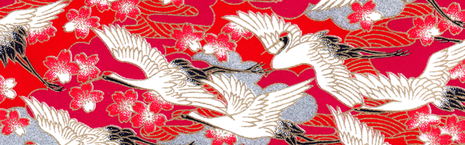 Papier japonais de grues blanches au fond framboise